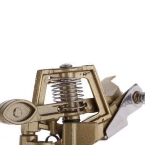 Water sprinkler nozzle spraying mist coverage across farm crops and lawn grass